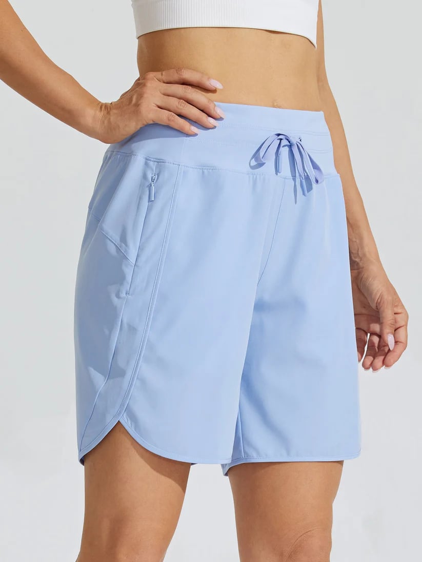 Short sport femme taille haute avec cordon et poches