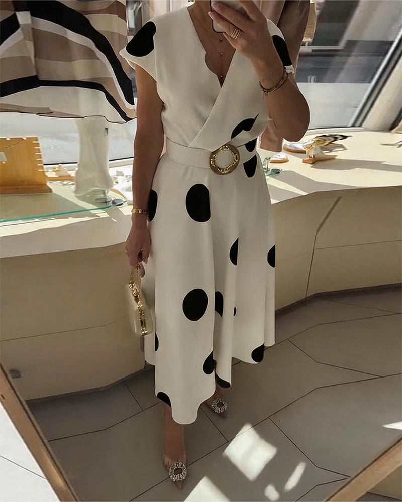 Robe femme à pois avec col V croisé et taille ceinturée