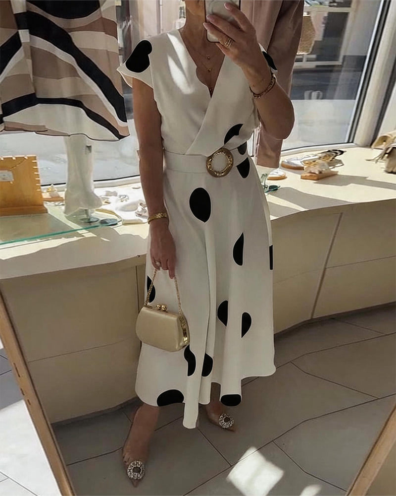 Robe femme à pois avec col V croisé et taille ceinturée