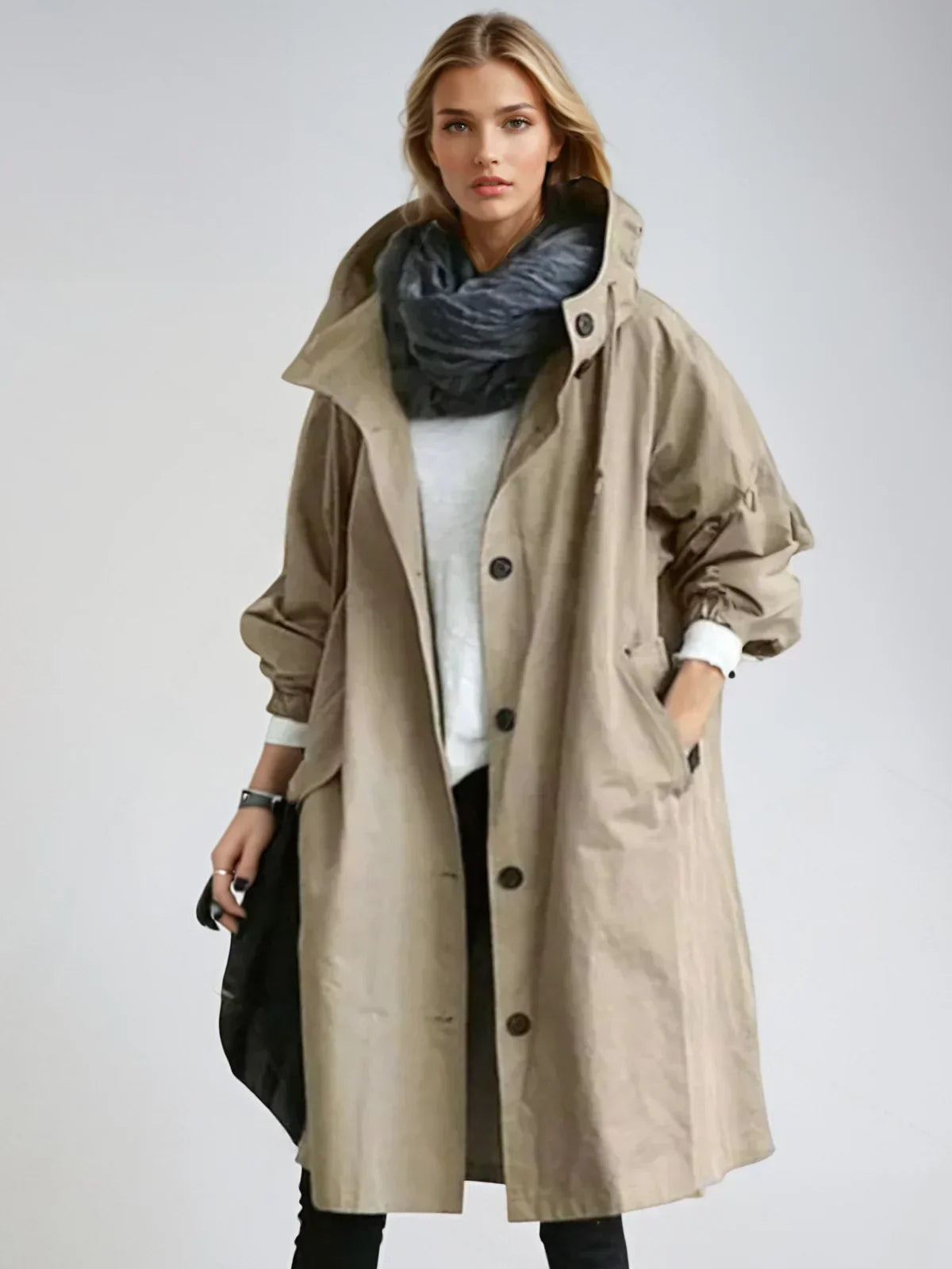 Imperméable femme avec capuche et ceinture – manteau de pluie élégant
