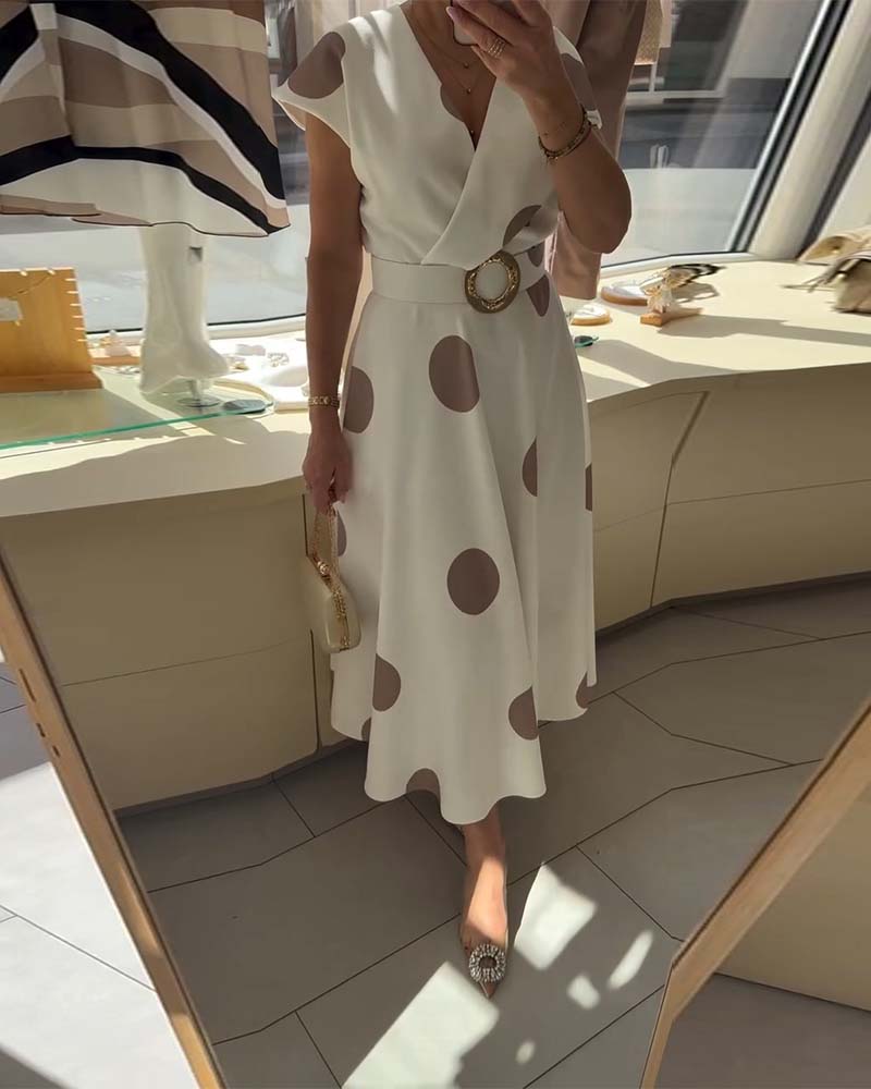 Robe femme à pois avec col V croisé et taille ceinturée