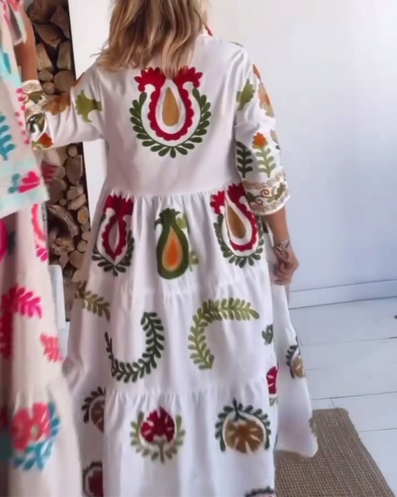 Robe femme midi imprimé floral graphique à col revers – style fluide été
