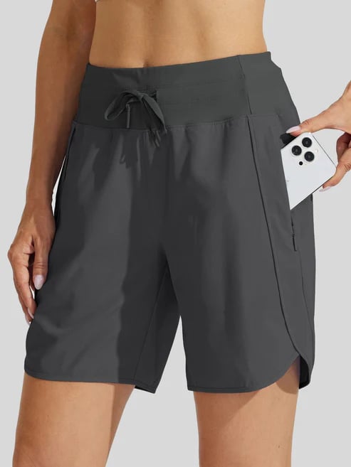 Short sport femme taille haute avec cordon et poches