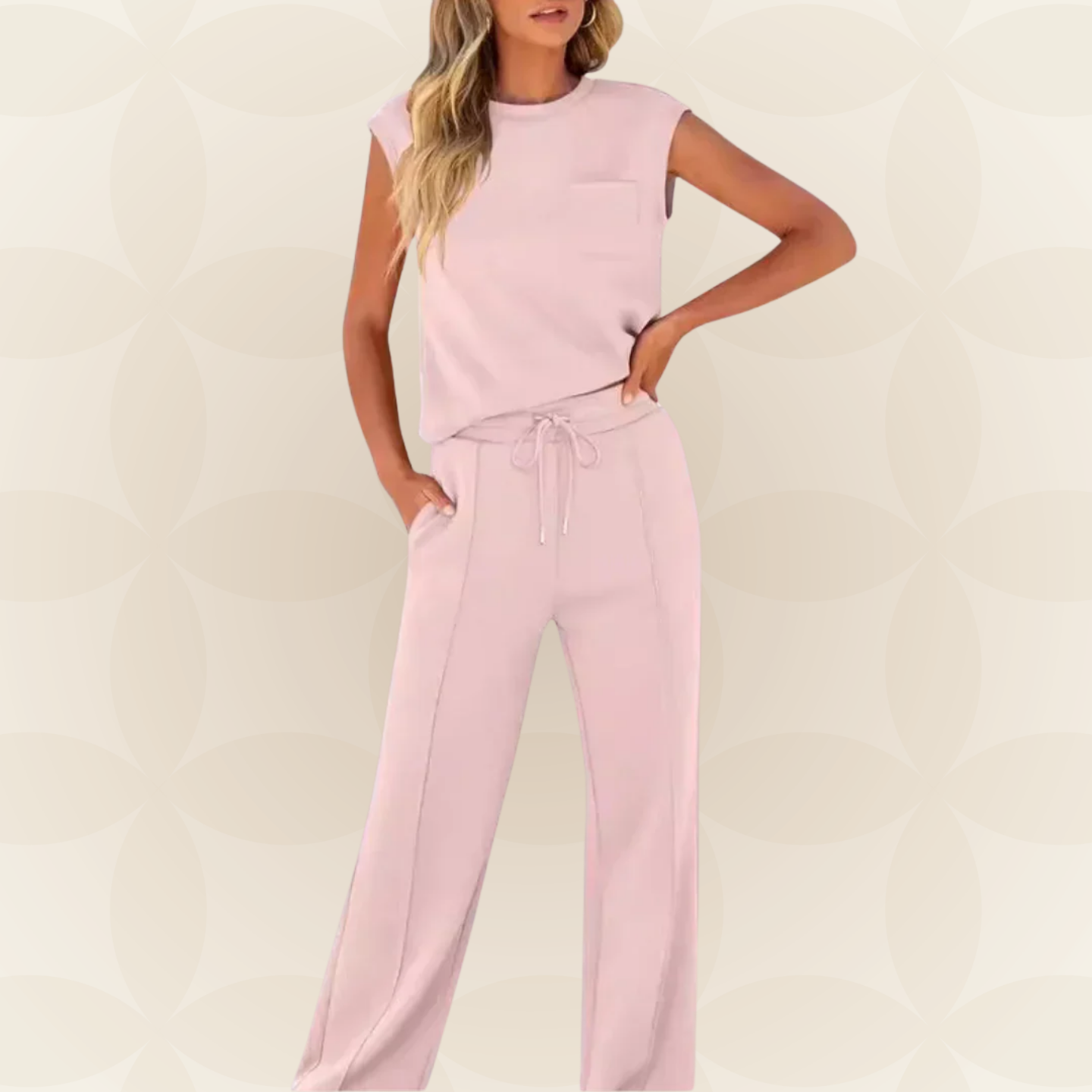 Ensemble femme élégant avec top sans manches et pantalon large fluide