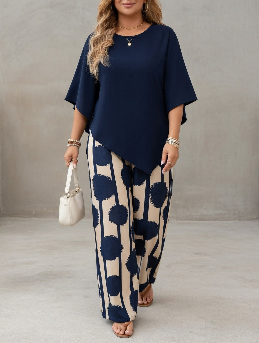 Ensemble femme élégant avec top asymétrique fluide et pantalon imprimé