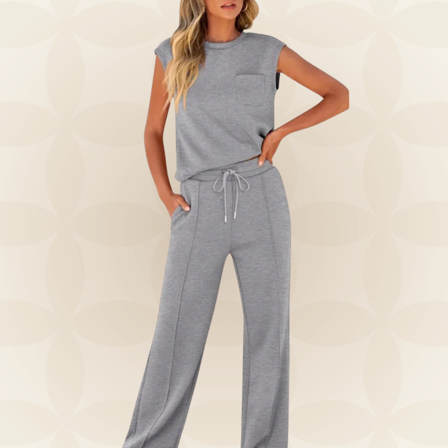 Ensemble femme élégant avec top sans manches et pantalon large fluide