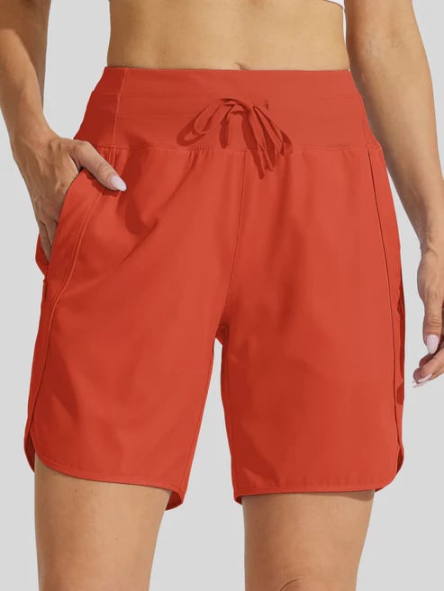 Short sport femme taille haute avec cordon et poches