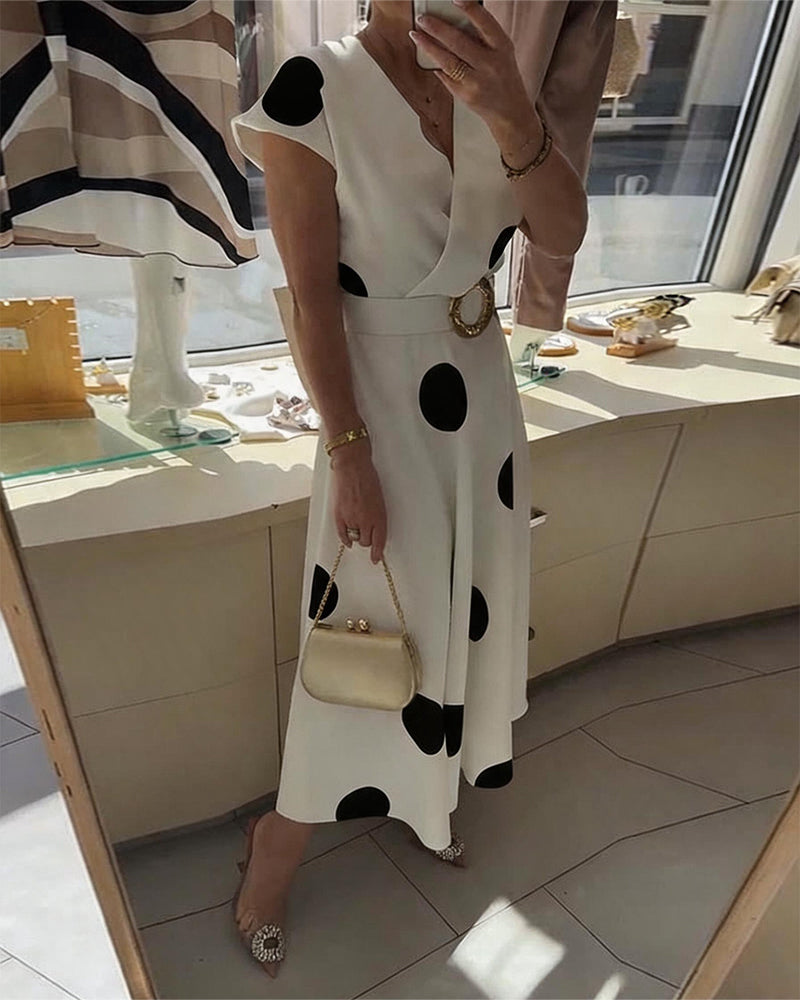 Robe femme à pois avec col V croisé et taille ceinturée