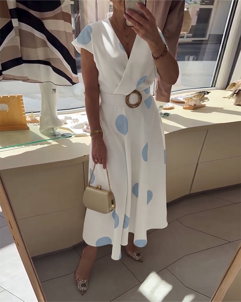 Robe femme à pois avec col V croisé et taille ceinturée
