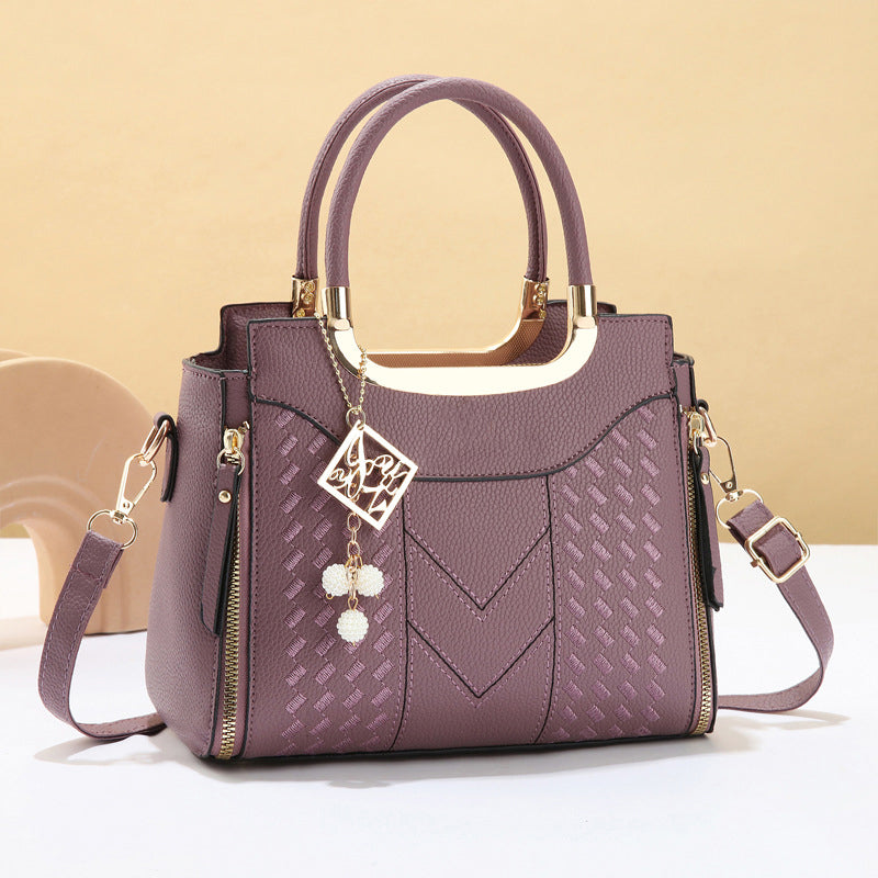 Sac à main femme matelassé avec bandoulière ajustable