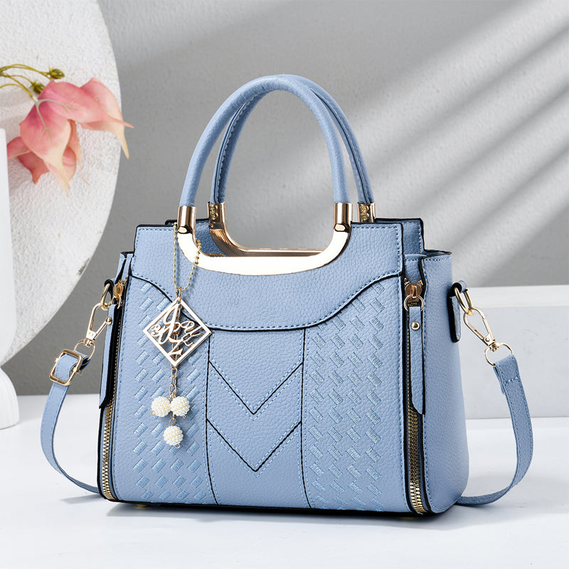Sac à main femme matelassé avec bandoulière ajustable