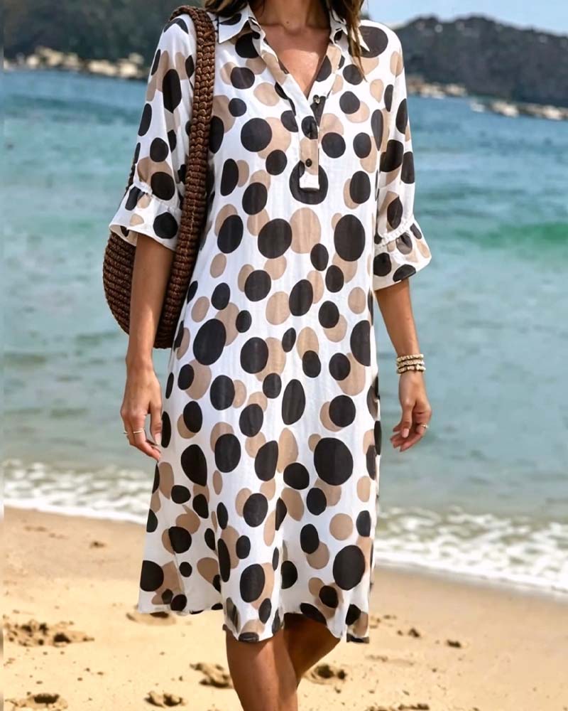 Robe femme à pois élégants et col V fluide