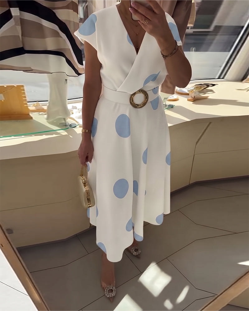 Robe femme à pois avec col V croisé et taille ceinturée