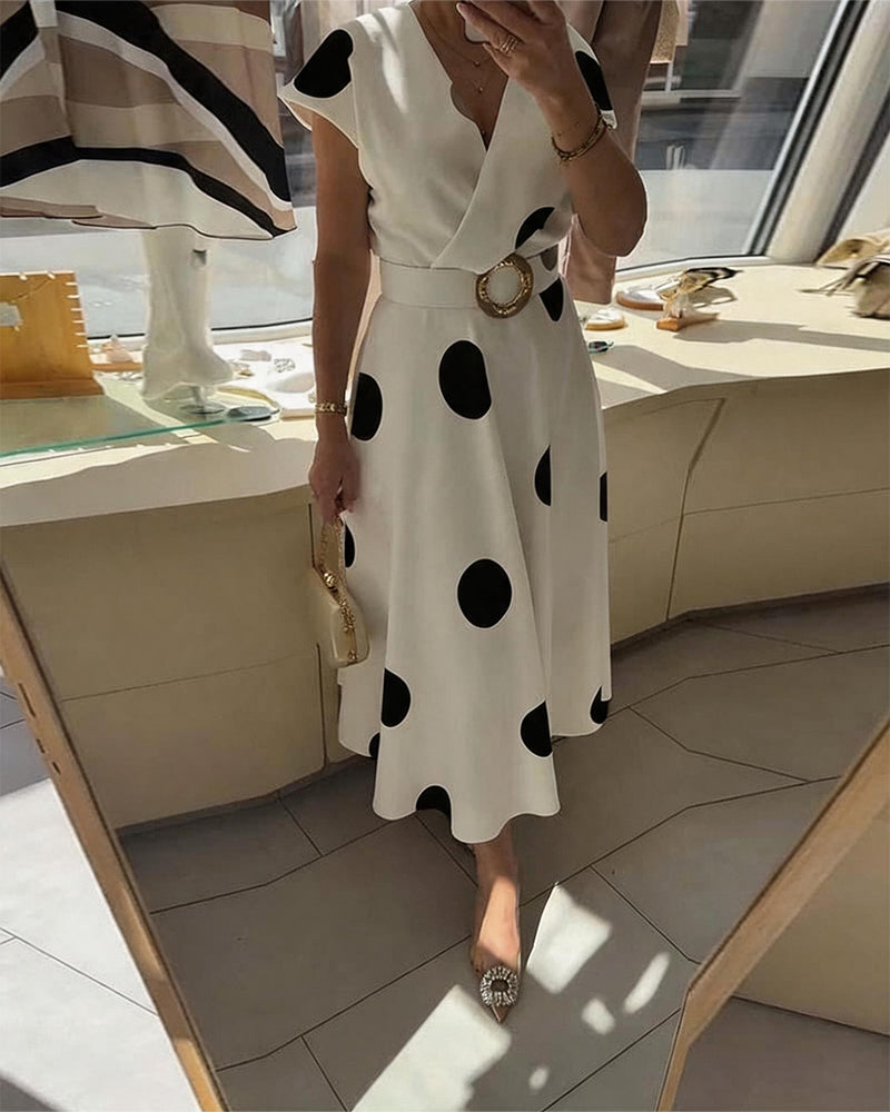 Robe femme à pois avec col V croisé et taille ceinturée