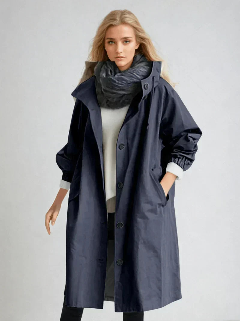 Imperméable femme avec capuche et ceinture – manteau de pluie élégant
