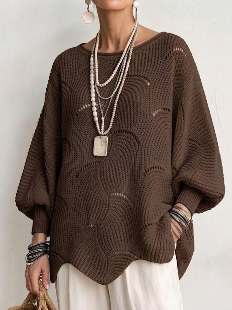 Pull femme ajouré en maille avec motif ondulé