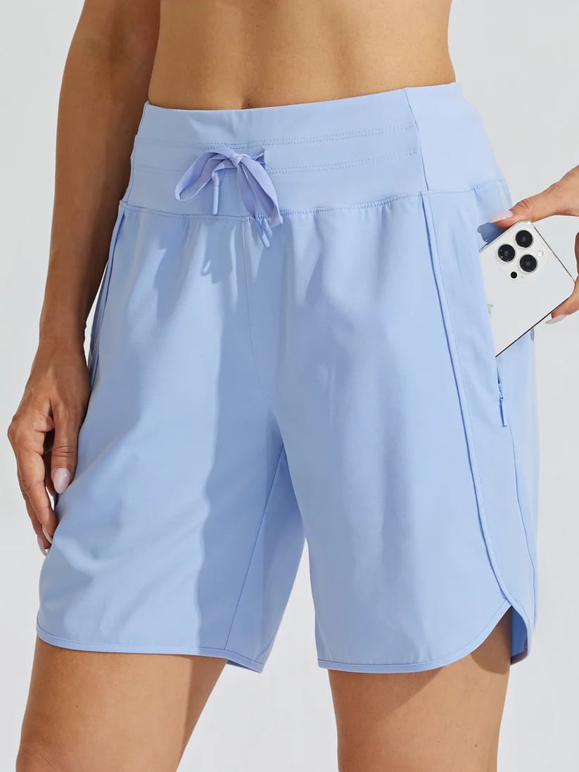 Short sport femme taille haute avec cordon et poches