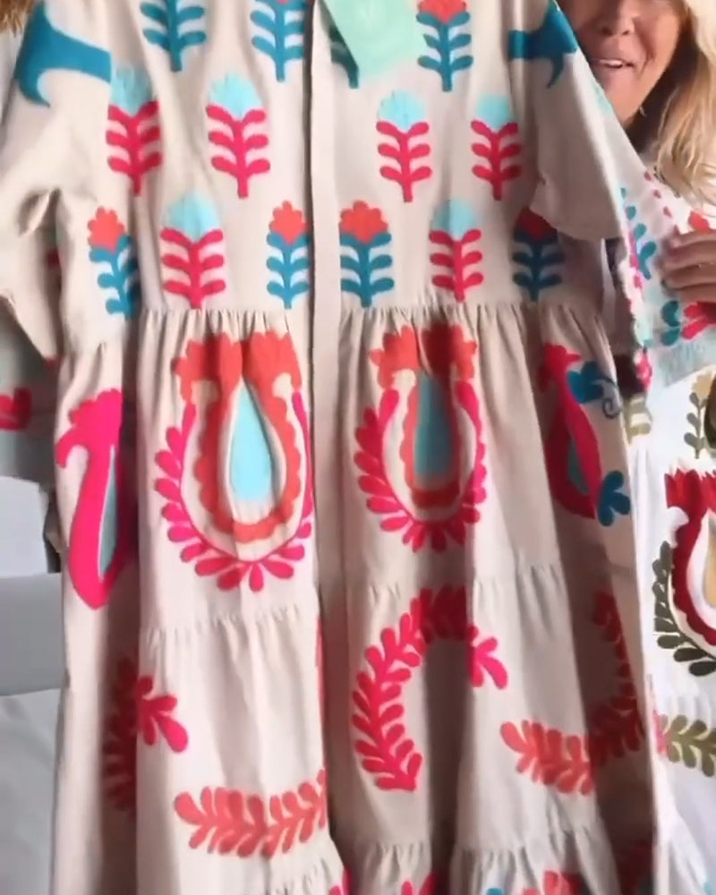 Robe femme midi imprimé floral graphique à col revers – style fluide été