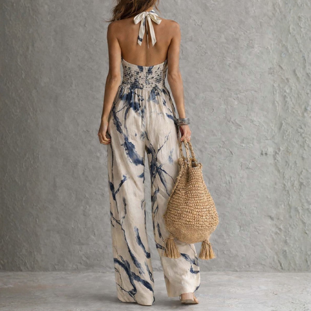Combinaison femme à col halter avec imprimé artistique et jambes larges