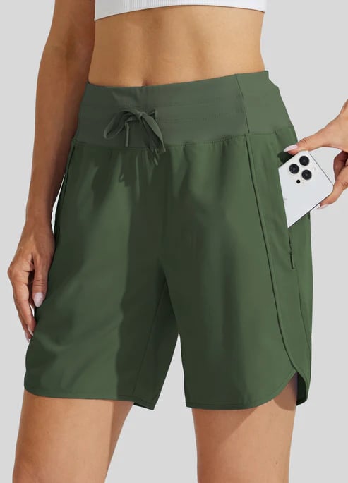 Short sport femme taille haute avec cordon et poches