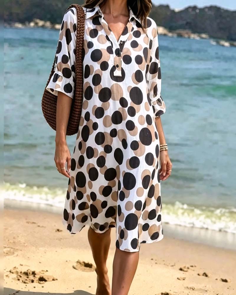 Robe femme à pois élégants et col V fluide