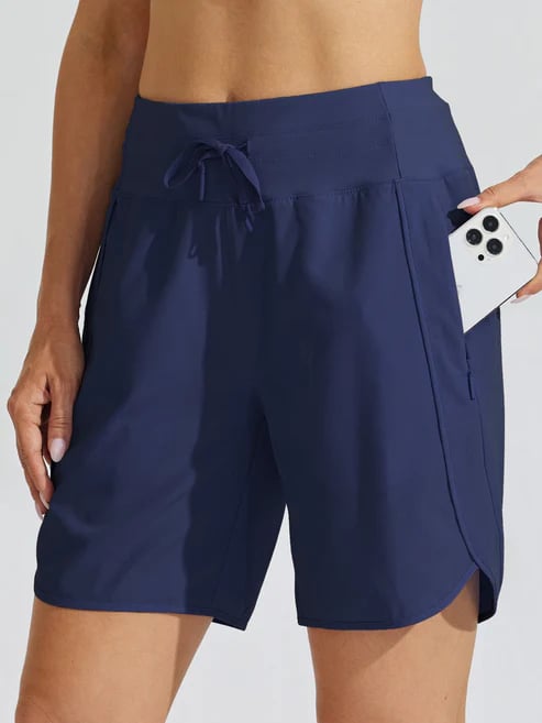 Short sport femme taille haute avec cordon et poches