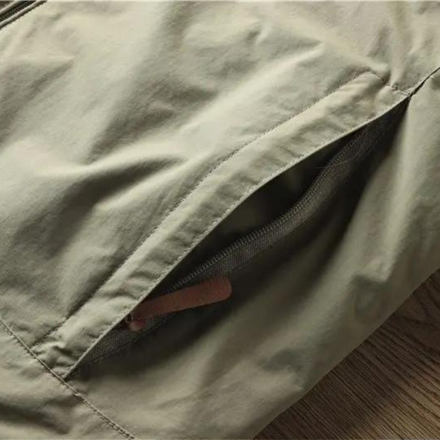 Veste imperméable homme à capuche et fermeture zippée