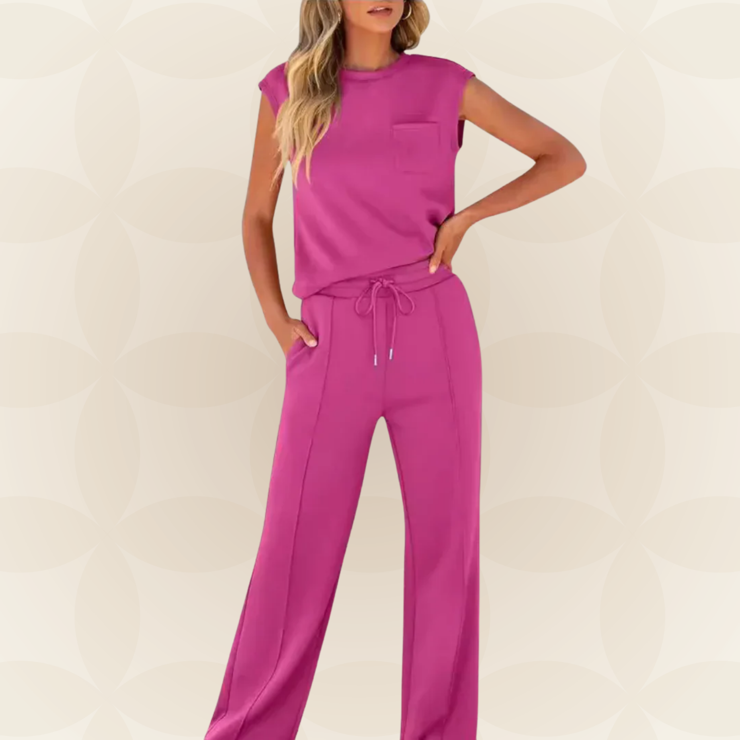 Ensemble femme élégant avec top sans manches et pantalon large fluide