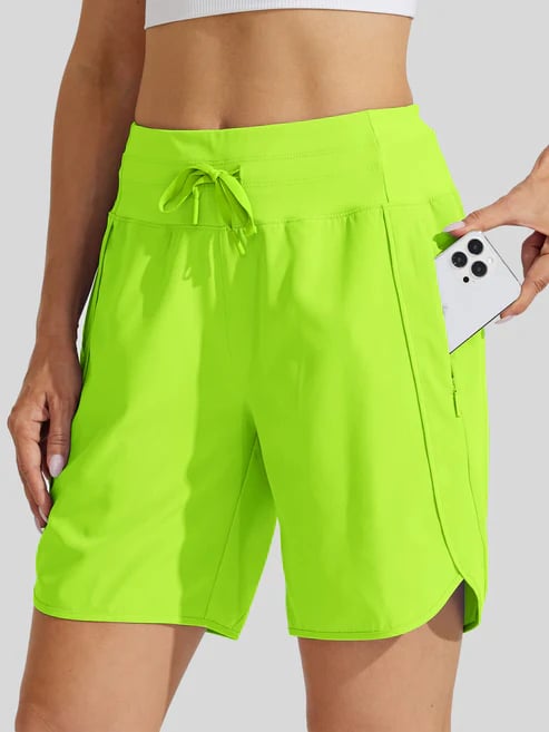 Short sport femme taille haute avec cordon et poches