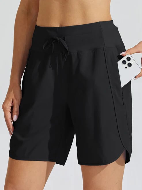 Short sport femme taille haute avec cordon et poches