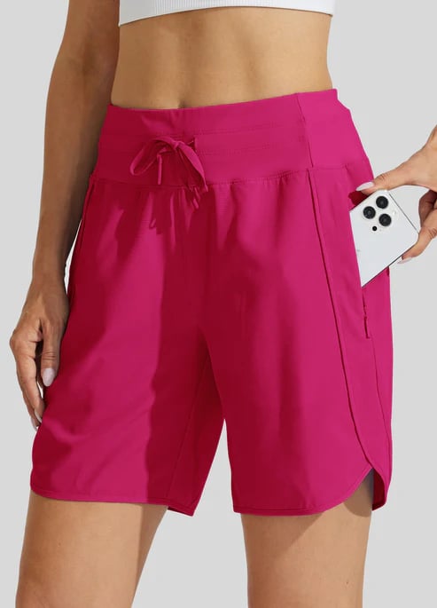 Short sport femme taille haute avec cordon et poches