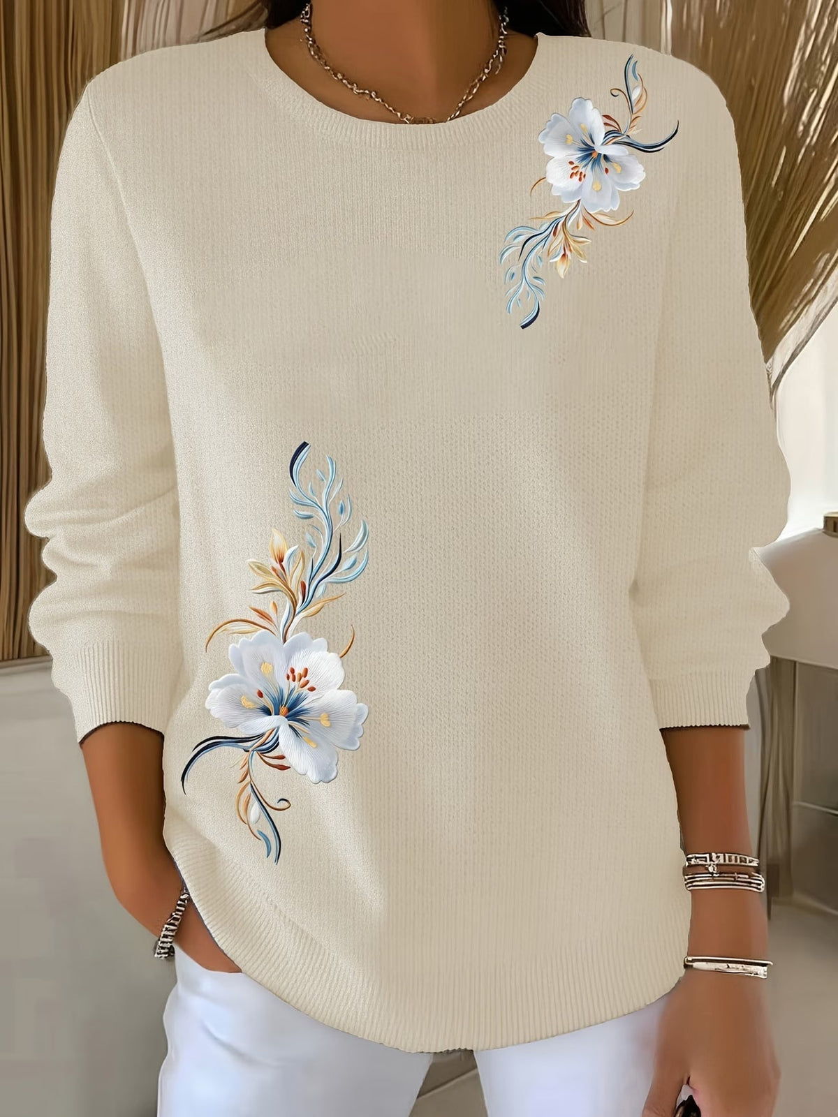 Pull femme en maille à imprimé floral col rond
