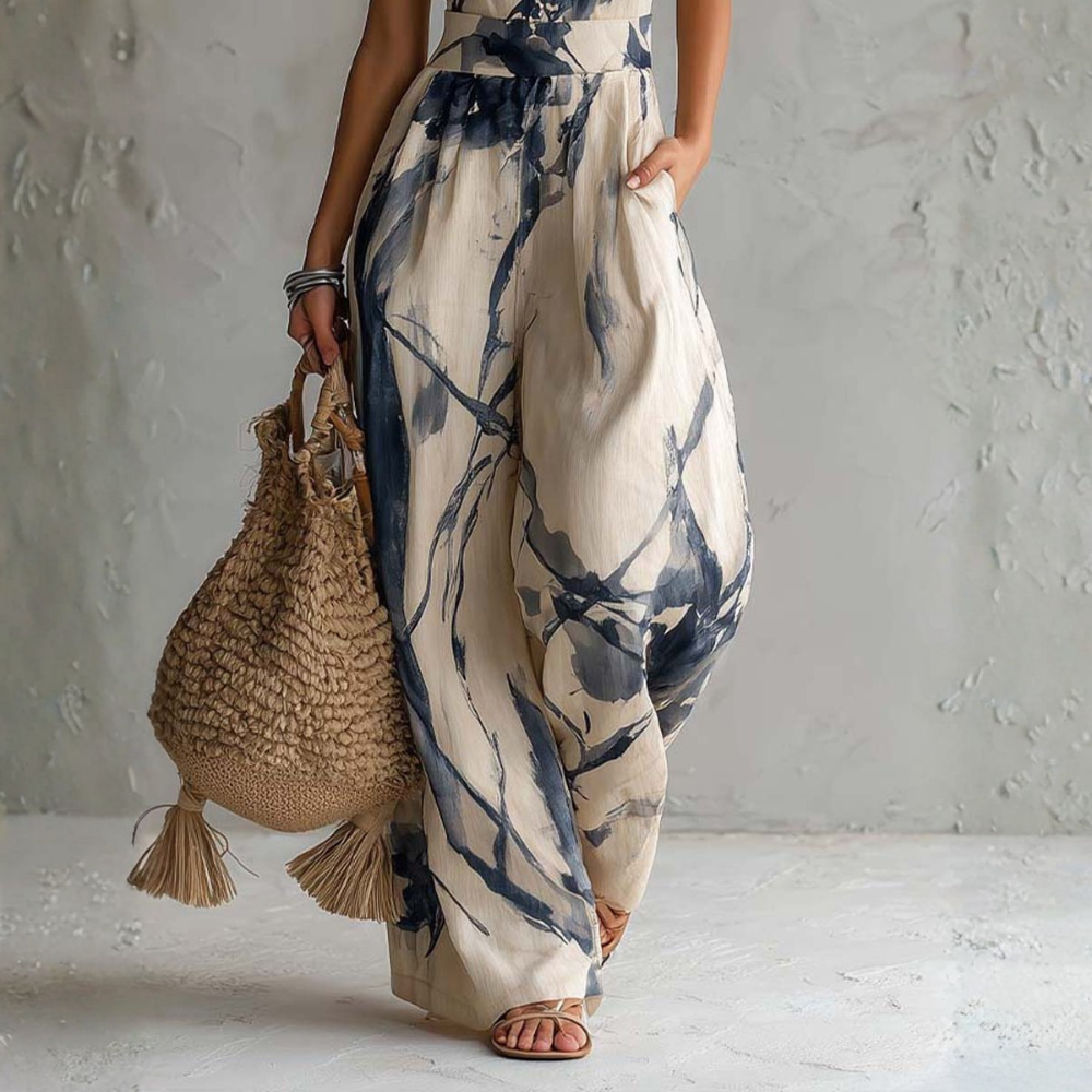 Combinaison femme à col halter avec imprimé artistique et jambes larges