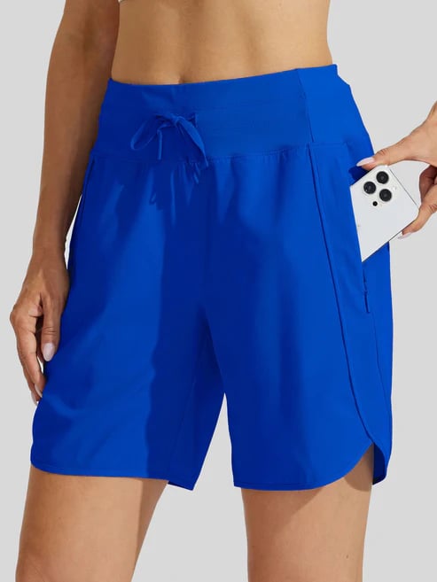 Short sport femme taille haute avec cordon et poches