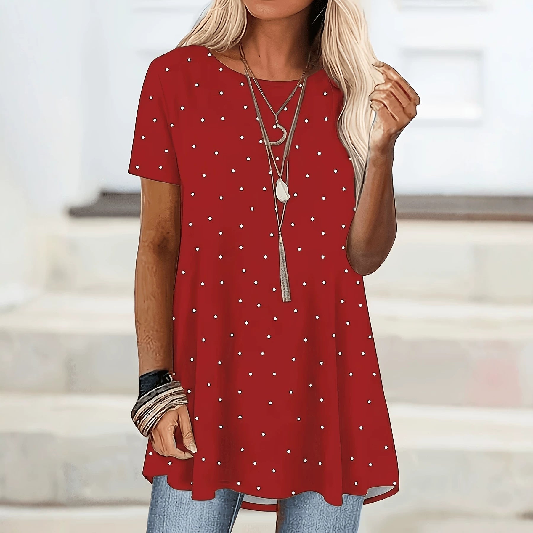 Blouse femme à pois avec manches courtes et coupe évasée