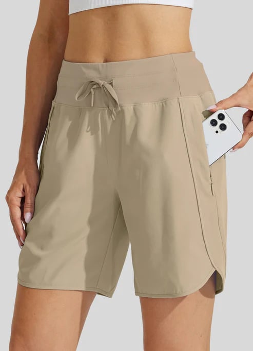 Short sport femme taille haute avec cordon et poches