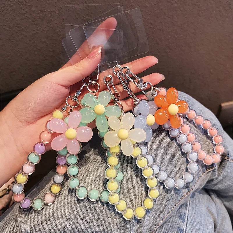 Dragonne de téléphone faite main pour femme, avec perles colorées et fleur décorative – le cadeau parfait