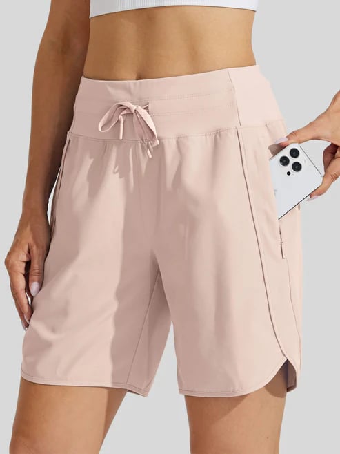 Short sport femme taille haute avec cordon et poches