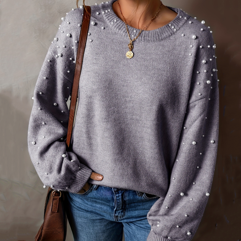 Pull femme à perles et manches bouffantes