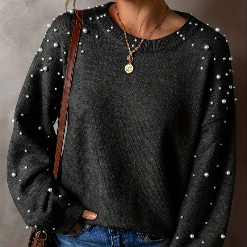 Pull femme à perles et manches bouffantes