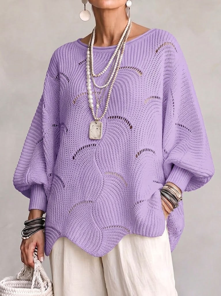 Pull femme ajouré en maille avec motif ondulé