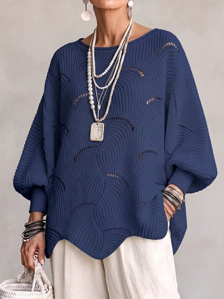 Pull femme ajouré en maille avec motif ondulé
