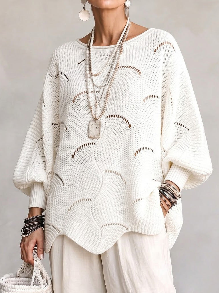 Pull femme ajouré en maille avec motif ondulé