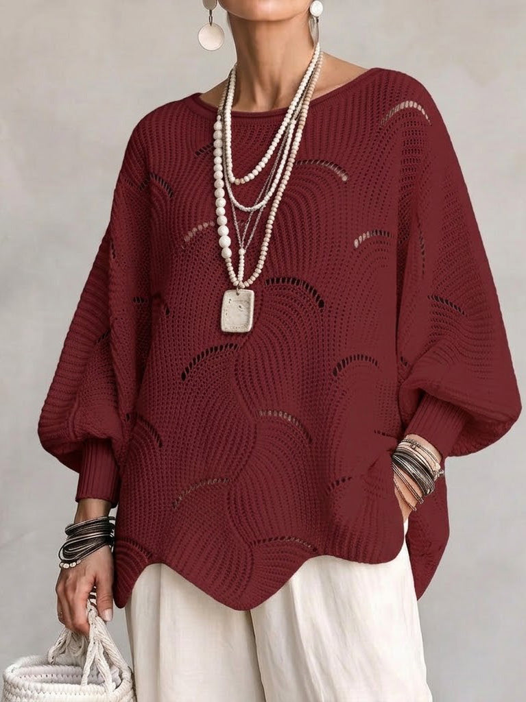 Pull femme ajouré en maille avec motif ondulé