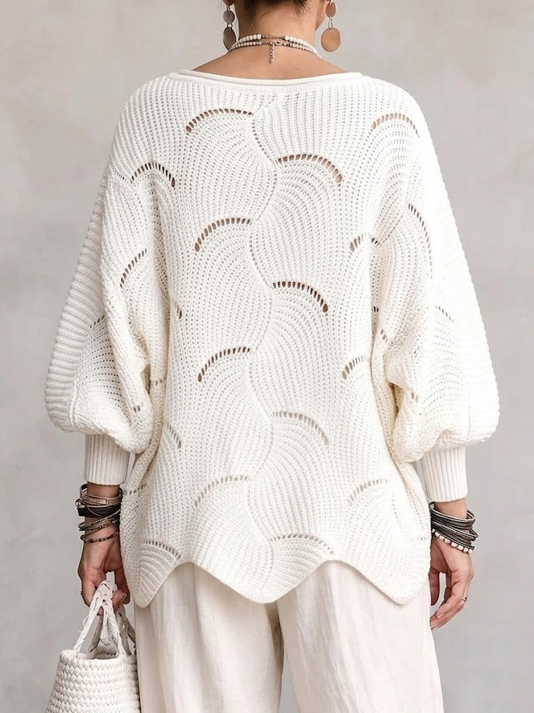 Pull femme ajouré en maille avec motif ondulé