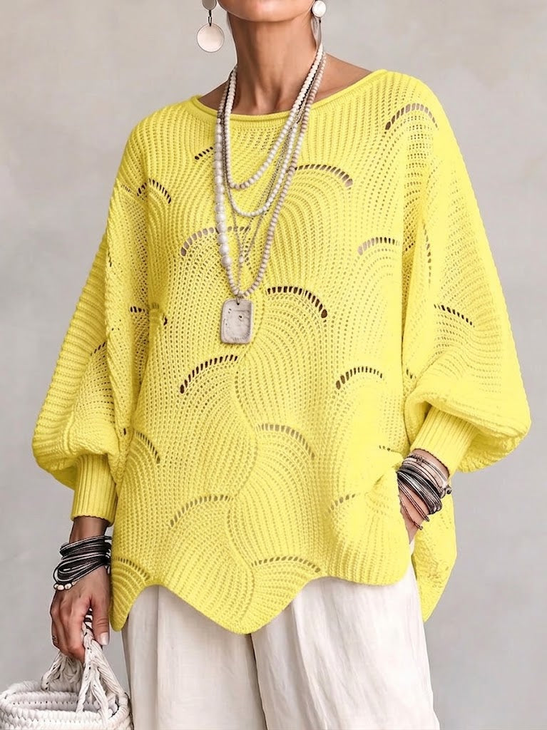 Pull femme ajouré en maille avec motif ondulé