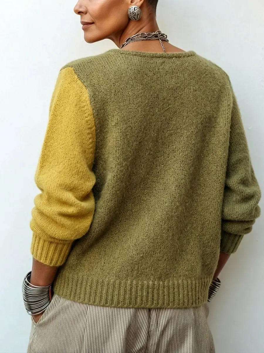 Pull femme color-block en maille à boutons asymétriques