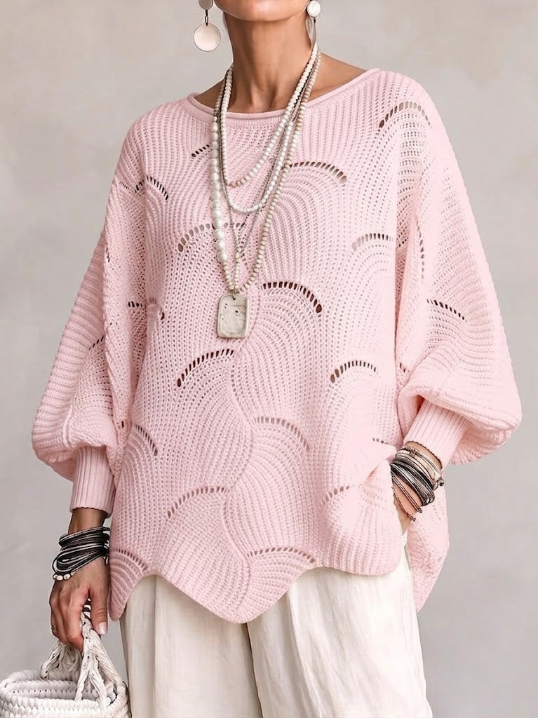 Pull femme ajouré en maille avec motif ondulé