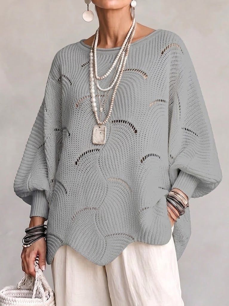 Pull femme ajouré en maille avec motif ondulé