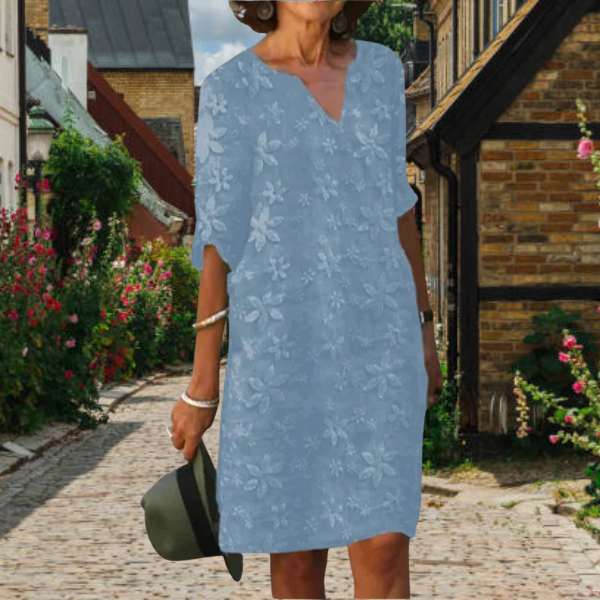 Robe femme blanche à fleurs avec col V et coupe fluide